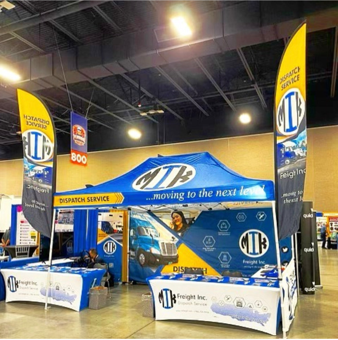 10' x 15' Pop Up Tent with Single-Sided Back Wall, (2) Single-Sided Half Walls, (2) 8' Stretch-Fit Table Covers, (2) Double-Sided 12' Flags with Cross Base