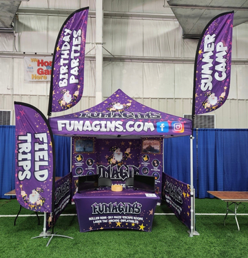 10’ x 10’ Tent with Double-Sided Full Wall & Half Walls, 6’ Stretch-Fit Table Cover, (2) Roll-Up Banners, and (3) 8’ Double-Sided Convex Flags with (2) Tent Attachment Clamps & (1) 4.4-lb Cross Base